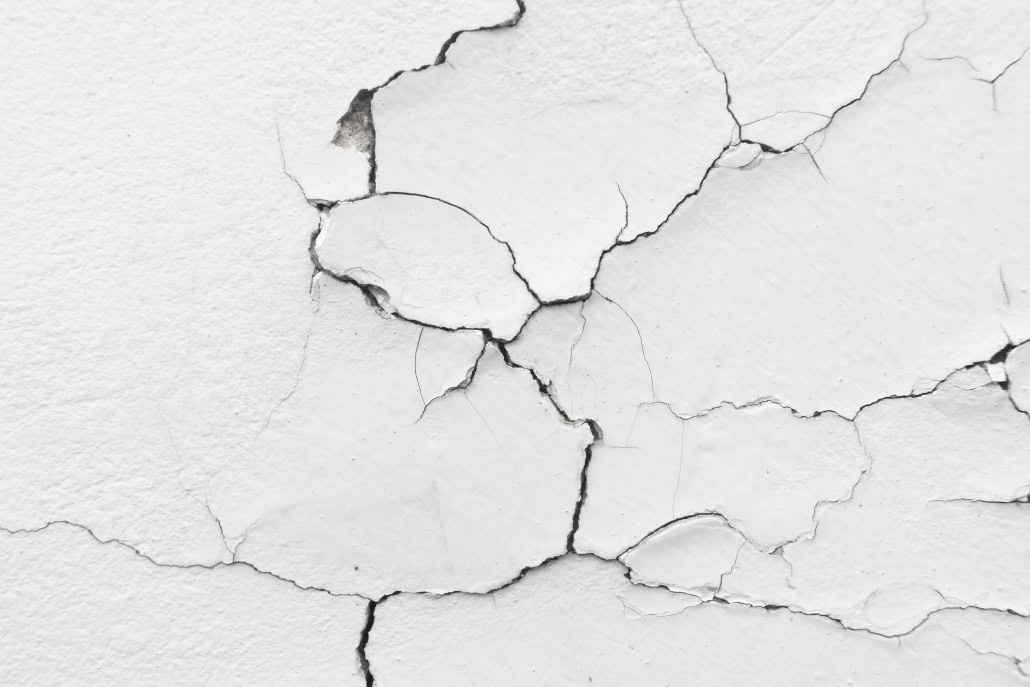 Close-up.,Badly,Fixed,Building,Facade,Wall,Covered,With,Cracks,In